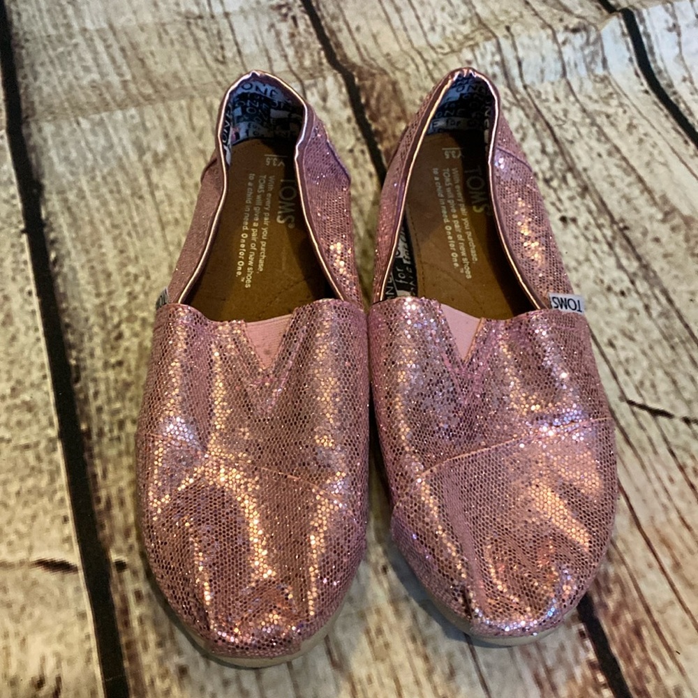 Tom’s pink glitter slip on shoes. Y-3.5/W-5-5.5